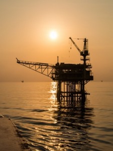 Oil Platform Silhouette with sun set 257x343